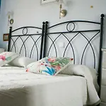 Carmen De Castro *